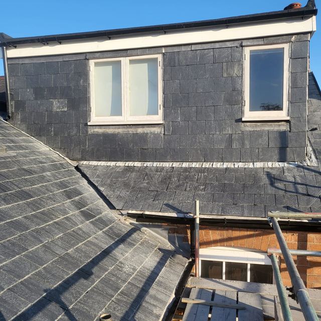 Slate-hung dormer with new windows