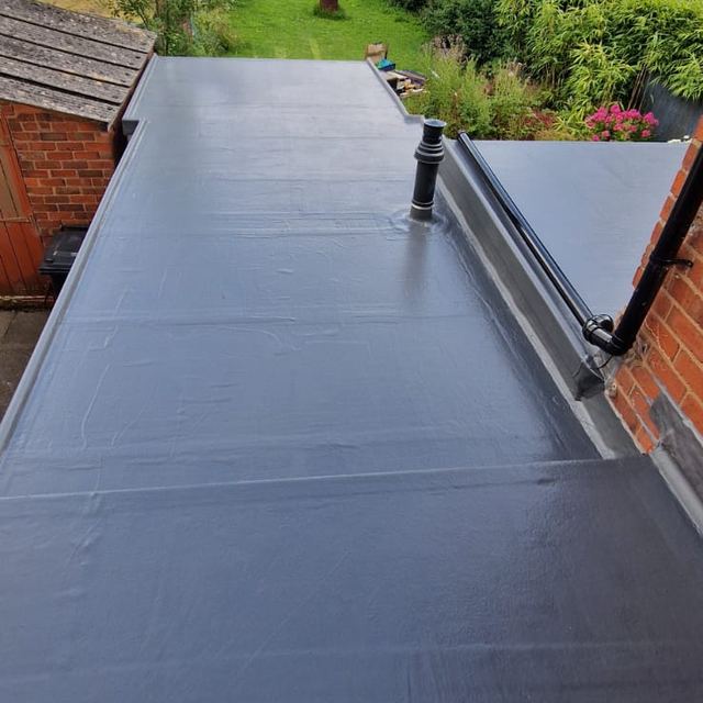 New rubber flat roof over a long rear extension