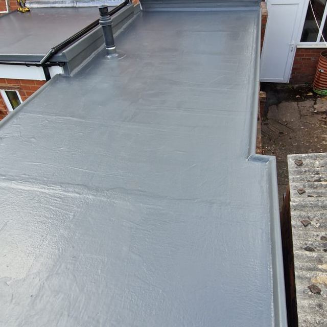 Grey fibreglass flat roof with new trims