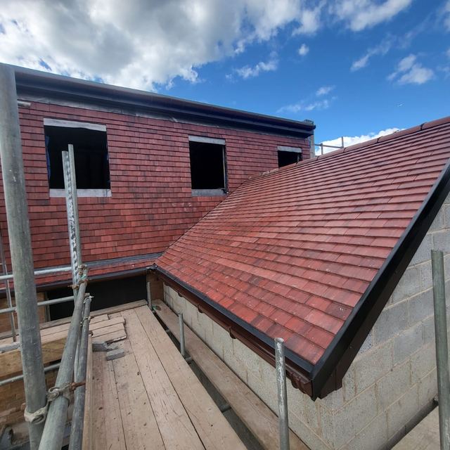 New red tiled roofs on an extension