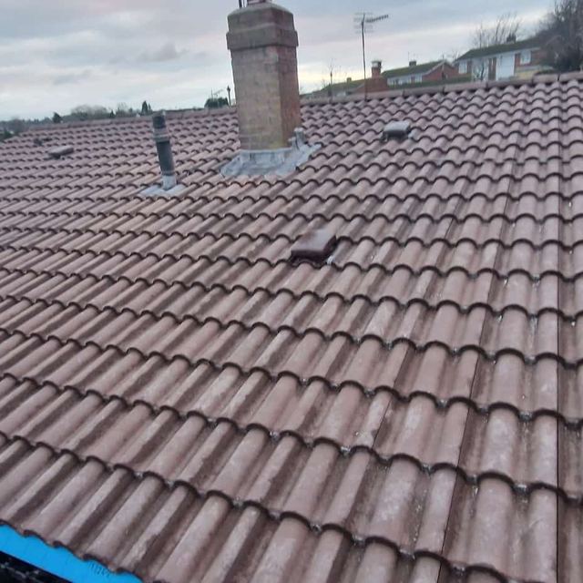 New interlocking tiled roof on a semi-detached house