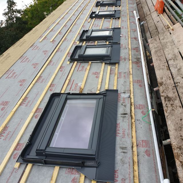 Five new roof windows on a long roof