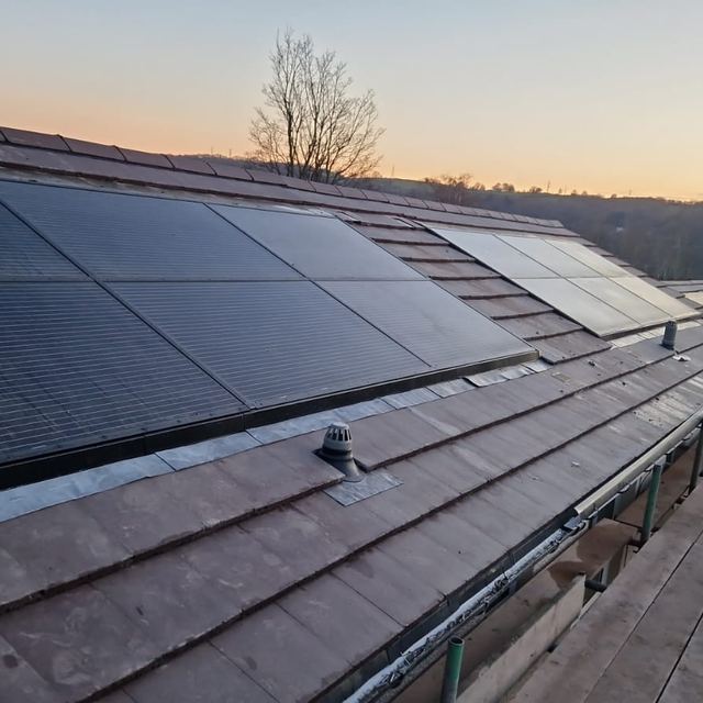 In-roof solar panels at sunset
