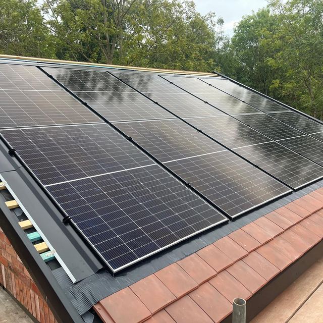 Solar panels fitted into a new tiled roof